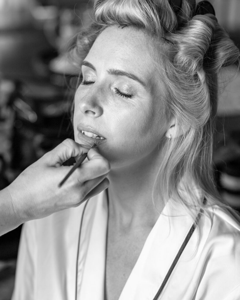 Lady having her make-up done ahead of a Paris photoshoot
