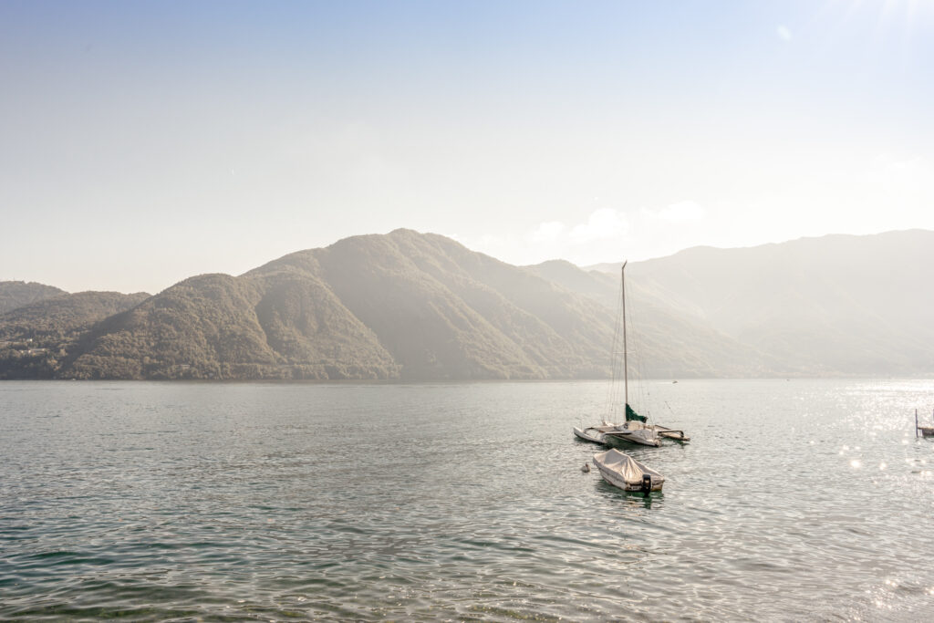 Landscape view of sailboats on lake como in italy