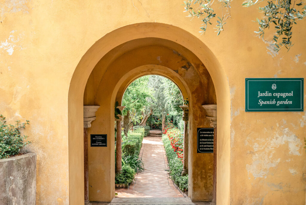 View through the archway to the Spanish Garden at Villa Ephrussi de Rothschild wedding venue on the French Riviera