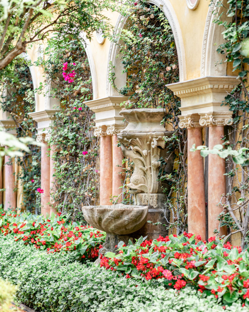 A stone fish water feature in the Spanish garden at Villa Ephrussi de Rothschild wedding venue on the French Riviera
