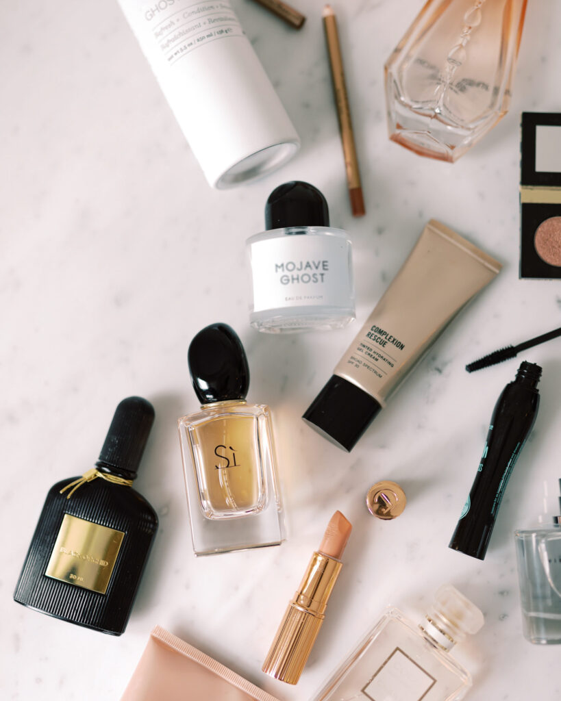 Flat lay of cosmetics and si fragrance