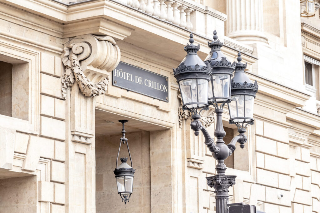 Close up of the Hôtel de Crillon, A Rosewood Hotel in Paris sign outside of the front door