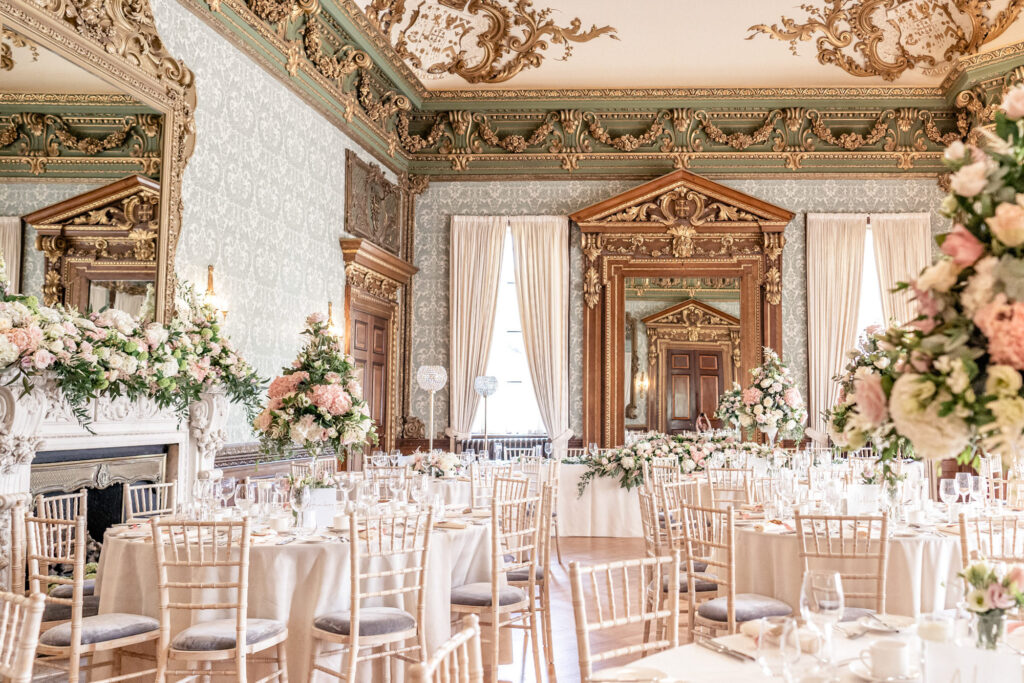 The wedding breakfast set up at the grand reception room at Hawkstone Hall in Shropshire, England