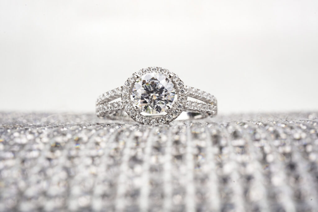 Macro photo of a blingy diamond ring.