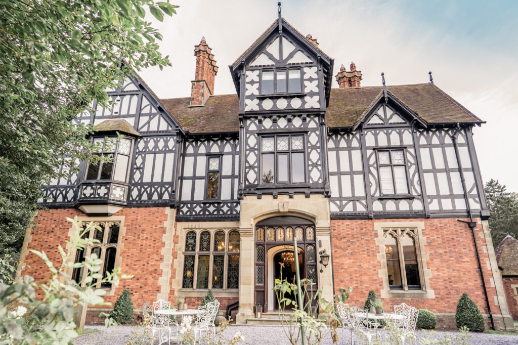 Exterior of the front of Tyn Dwr Hall showing the mock tudor style.