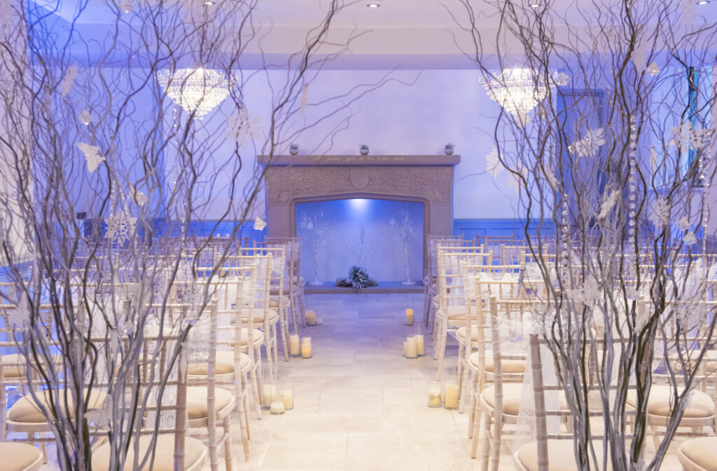 The ballroom at Tyn Dwr Hall dressed for a wedding ceremony.