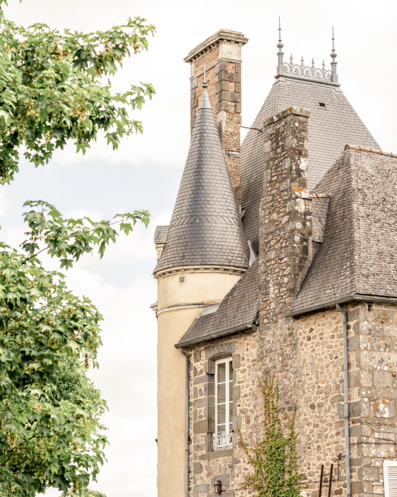 A close up of the roof and turret of Chateau du Grand Val wedding venue in Brittany, France. 