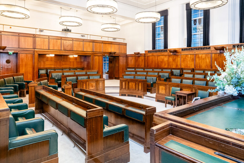 The seating of the Council Chamber wedding room at the Town Hall Hotel wedding venue in London